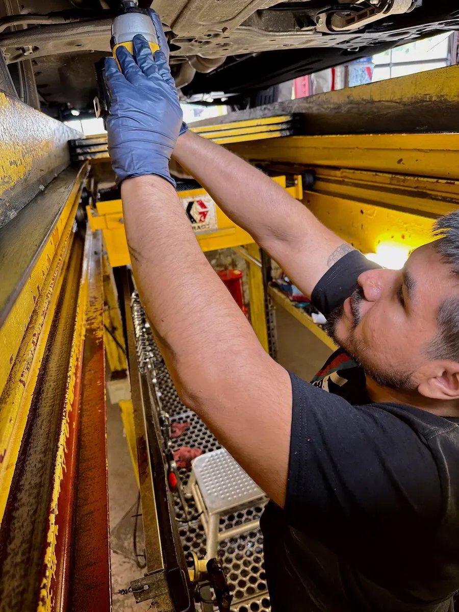 Orloski Employee working on car